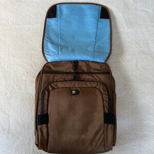 NWT Pacsafe Anti-theft MetroSafe 300 computer shoulder bag in tan with blue